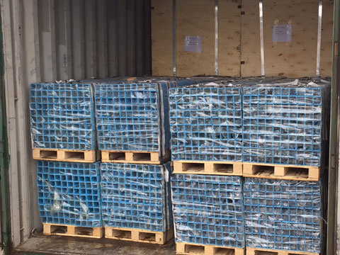 Sign posts on pallets loading container